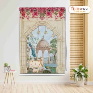 This Divine Kamadhenu Cow Design Pichwai Temple Roller Blind featuring an intricate Indian art scene of a white Kamadhenu cow and calf with two peacocks beneath a stone archway, showing a domed temple pavilion and water in the background, topped with a border of pink flowers and brass bell motifs.