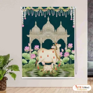 This Gau Mata and Calf Artistic Pichwai Roller Blind for Puja Room featuring an artistic, traditional Indian depiction of the sacred Kamadenu cow and calf standing in front of a temple archway, surrounded by pink lotus flowers against a dark blue background.